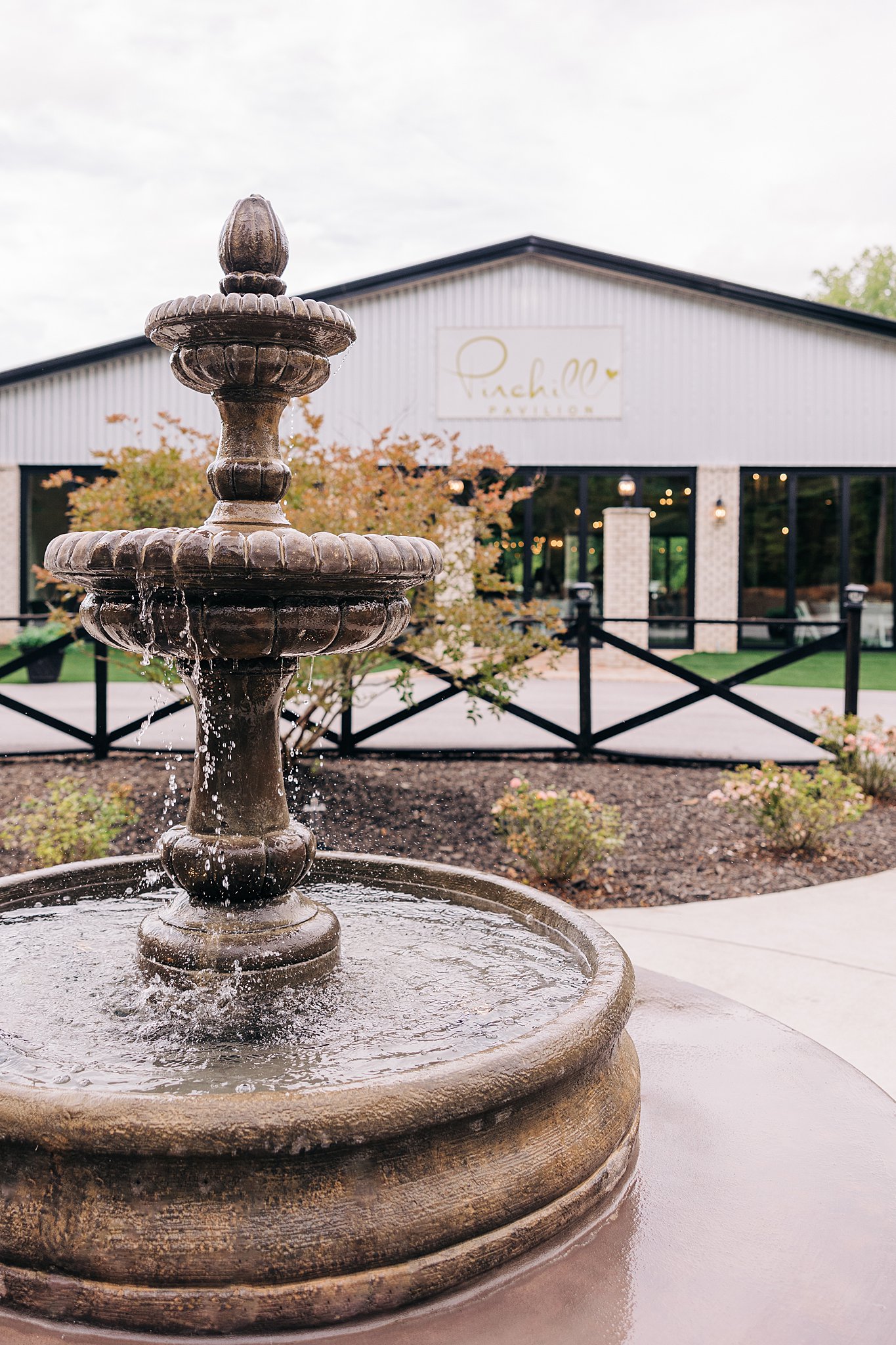 Details of the front entrance and fountain at the pinehill pavilion wedding venue
