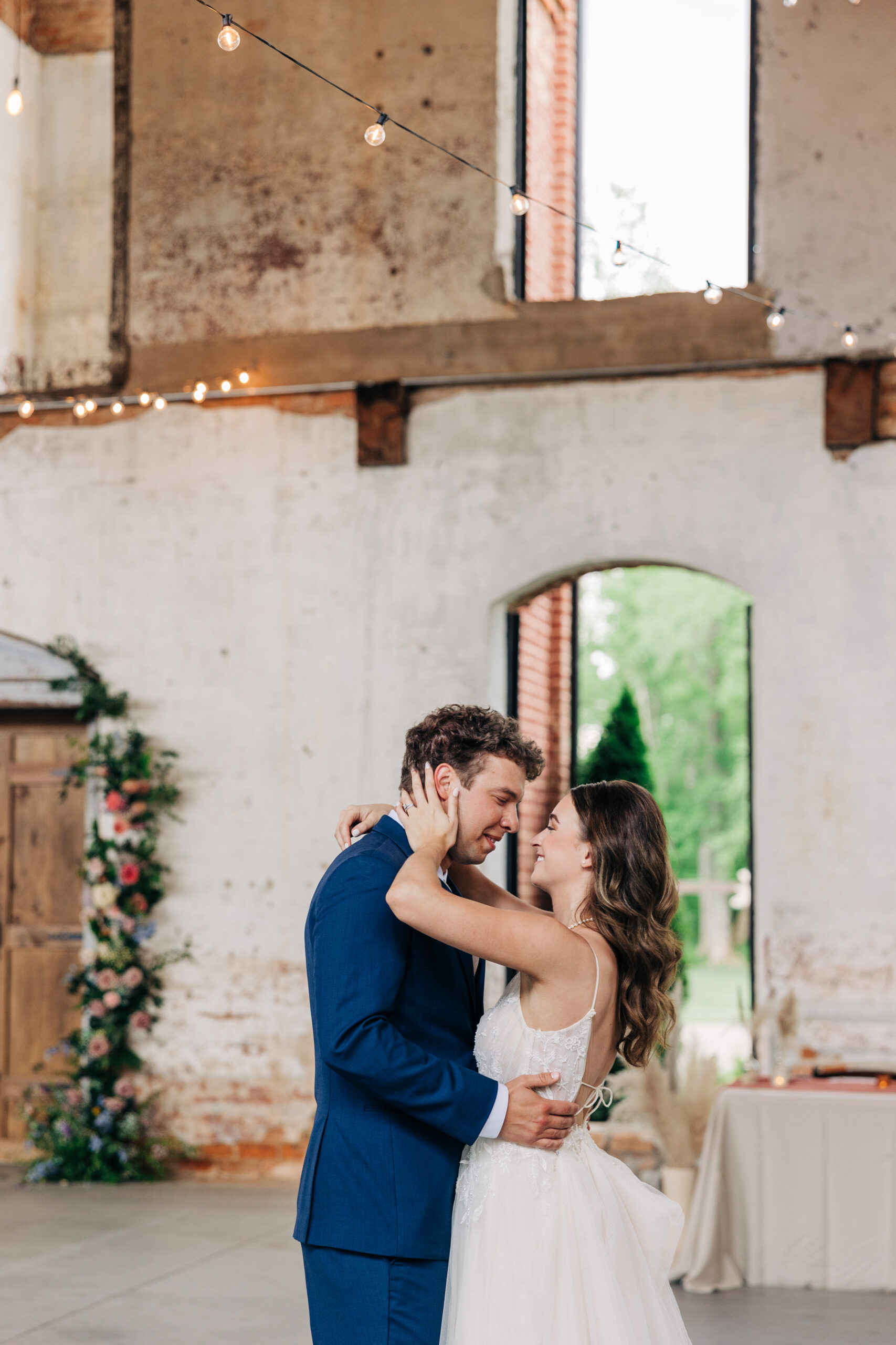 Newlyweds share an intimate dance at their Providence Cotton Mill wedding reception