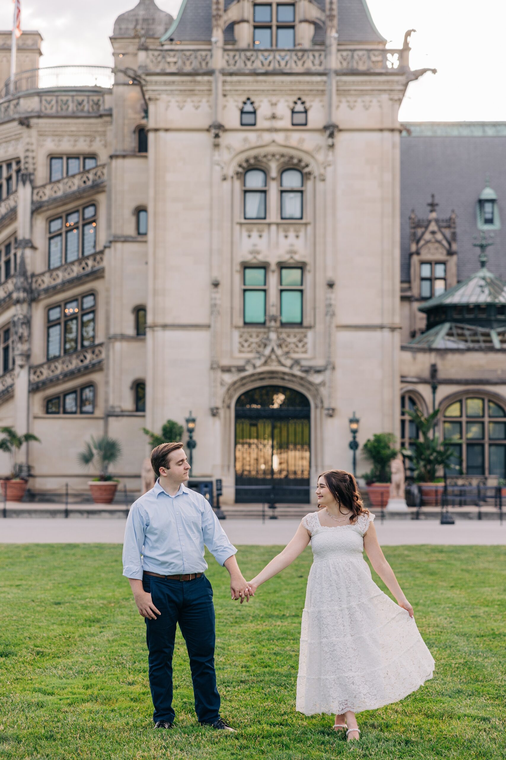 A bride and groom dance in the lawn of the biltmore estate wedding venue