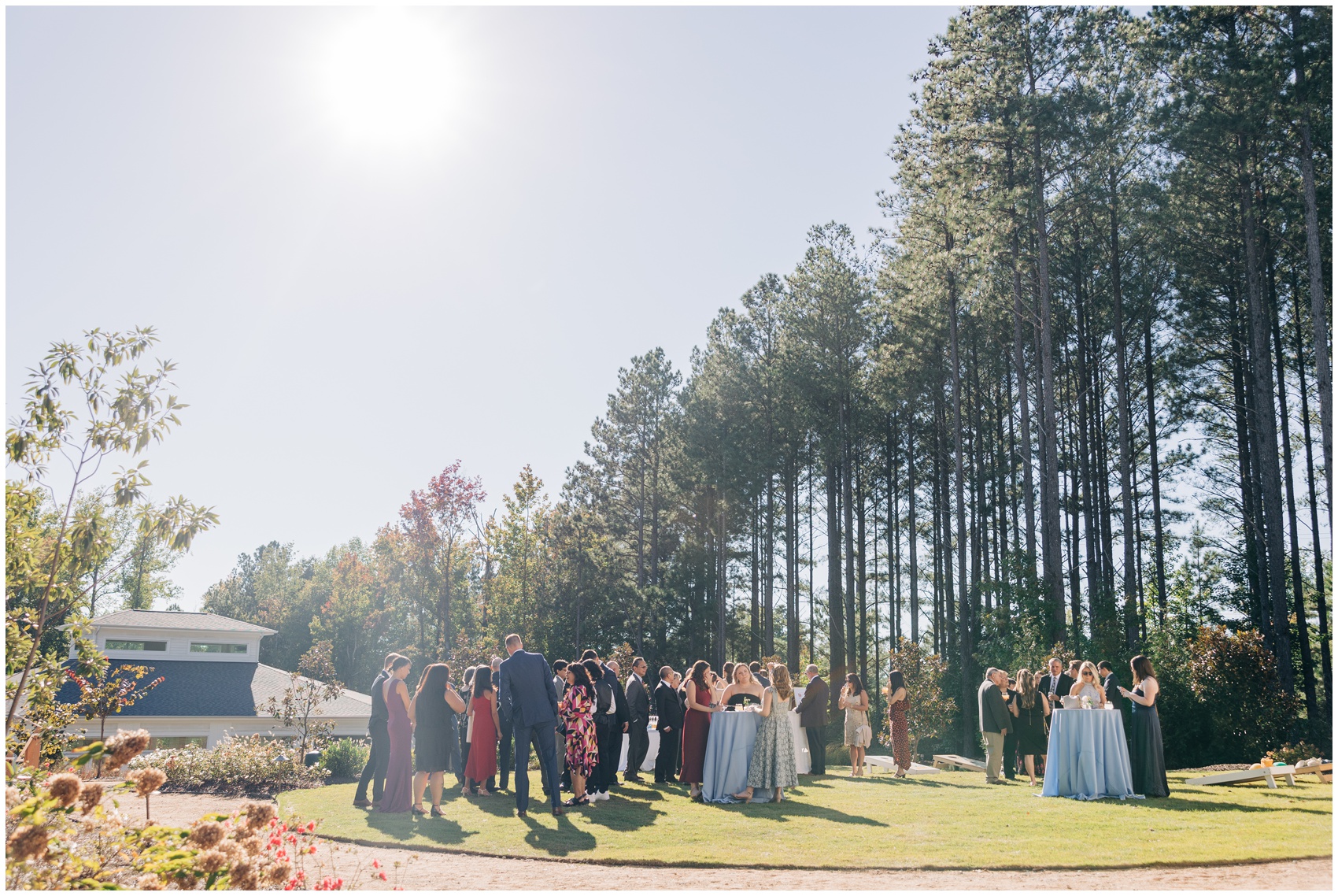 A view of a cocktail hour in the garden of the upchurch wedding venue