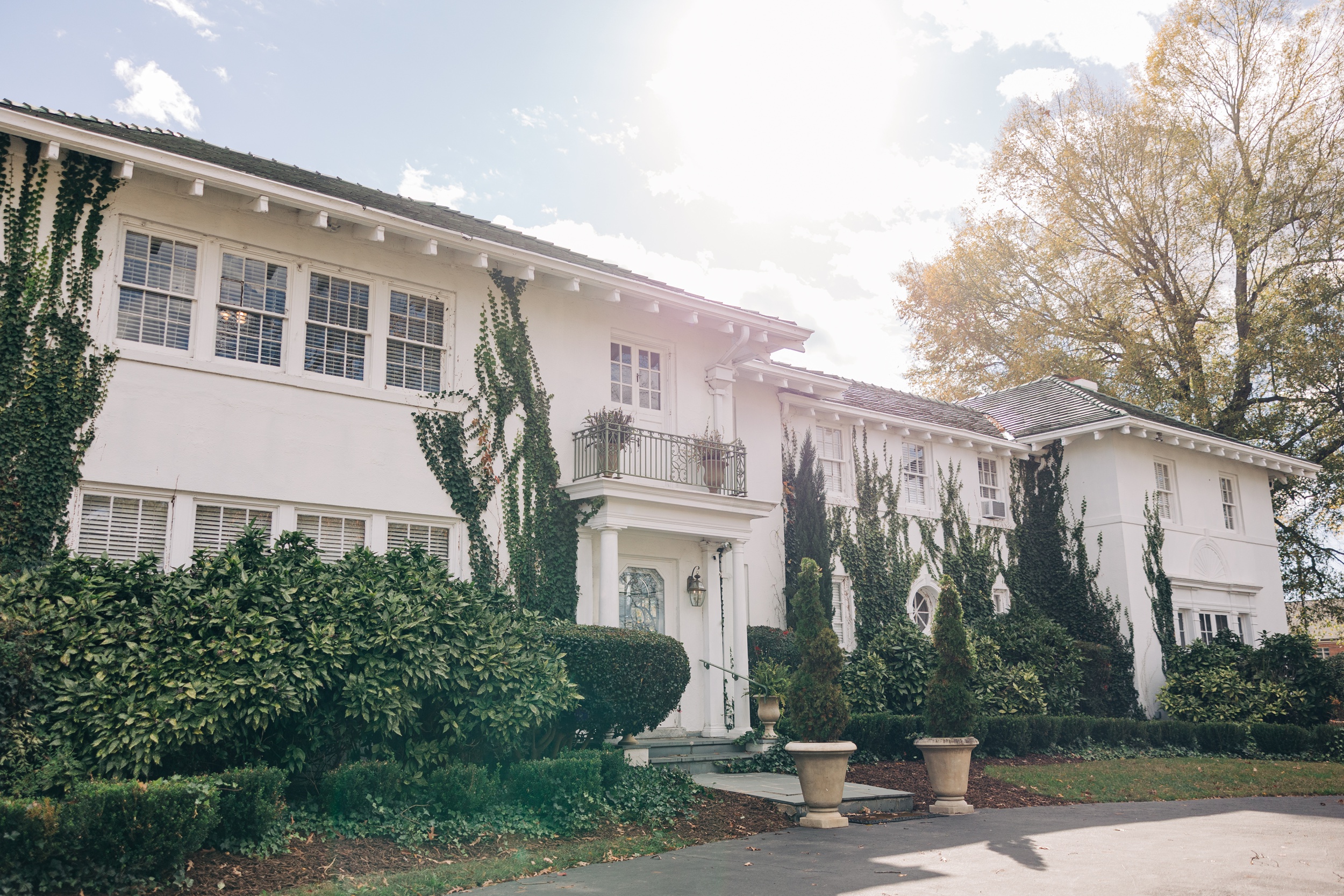 Details of the ivy covered front facade of The Finch House wedding venue