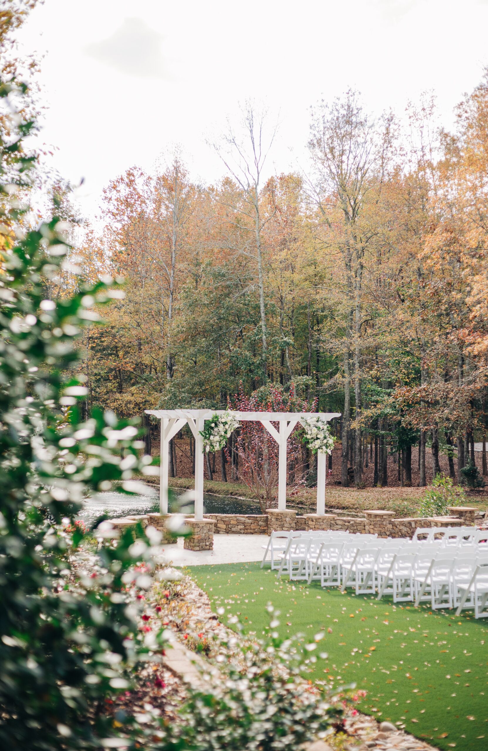 A peak at a covington gardens wedding ceremony set up by the pond