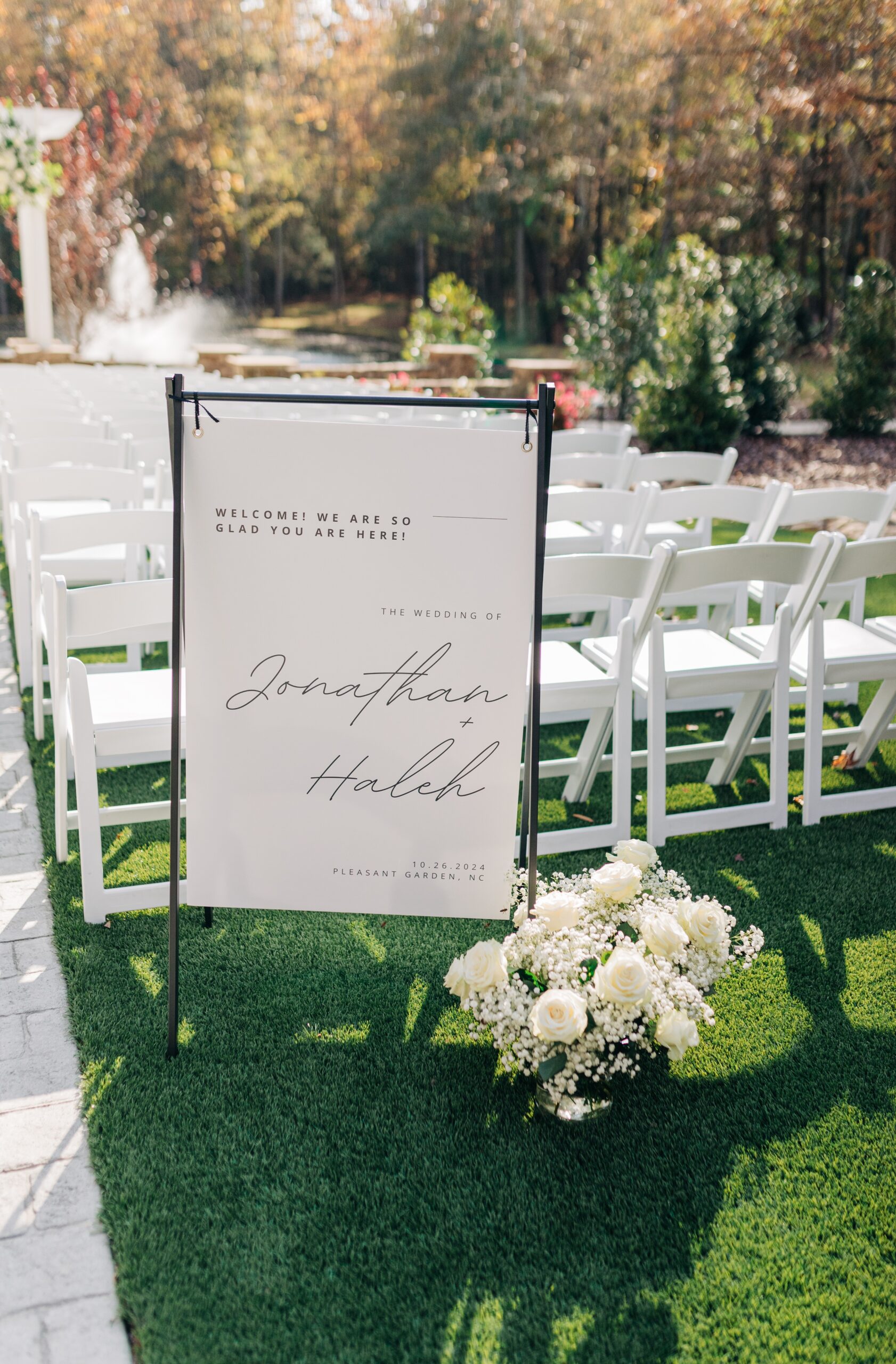 Details of a ceremony welcome sign for an outdoor ceremony at covington gardens