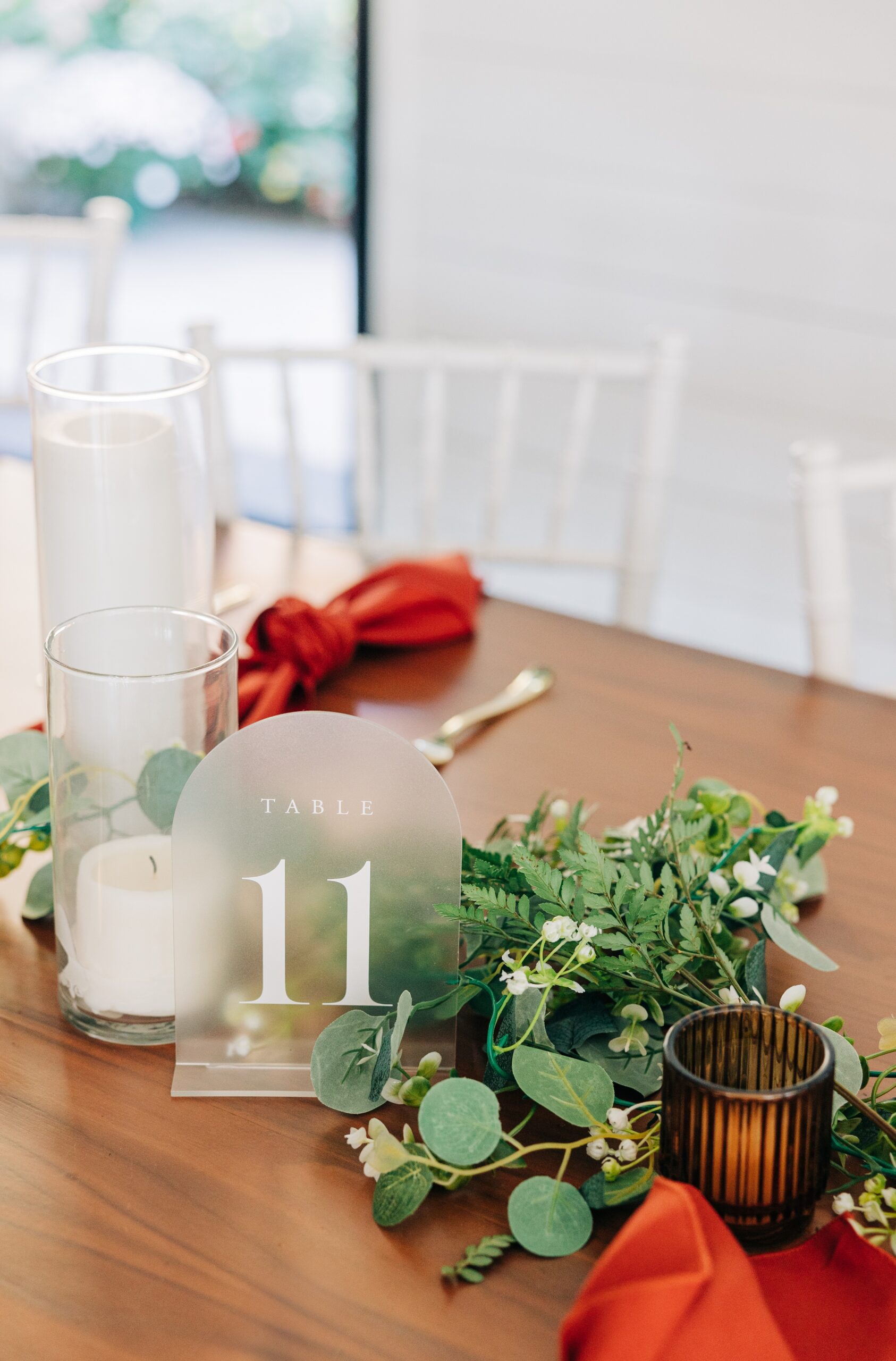 Details of a reception table set up with florals and candles at splendor pond flower farm