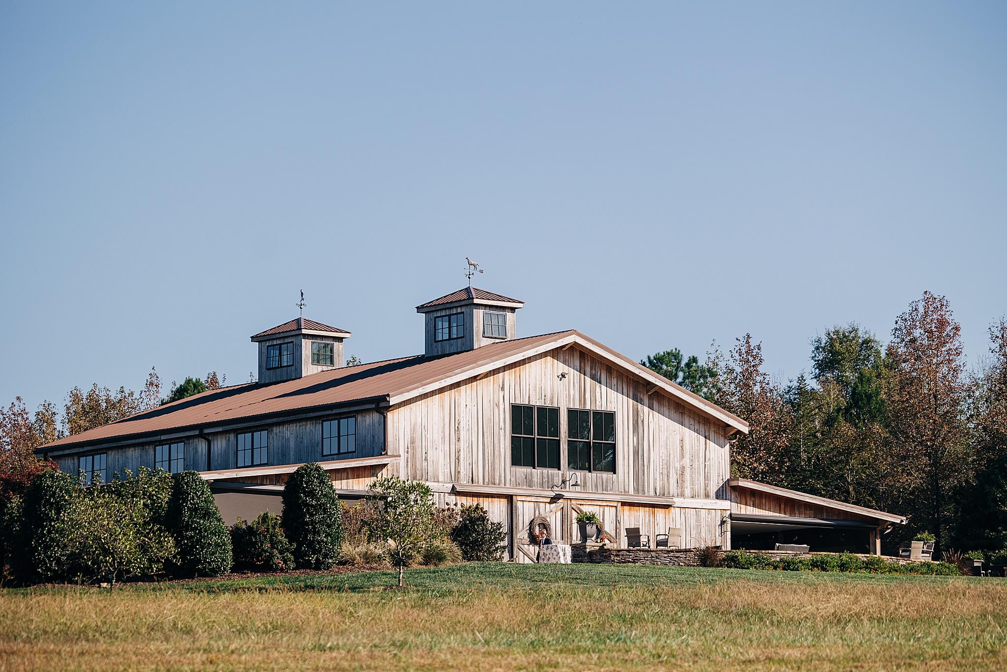 A look at the Hayfield at Murchison Farms wedding venue from the pasture at sunset