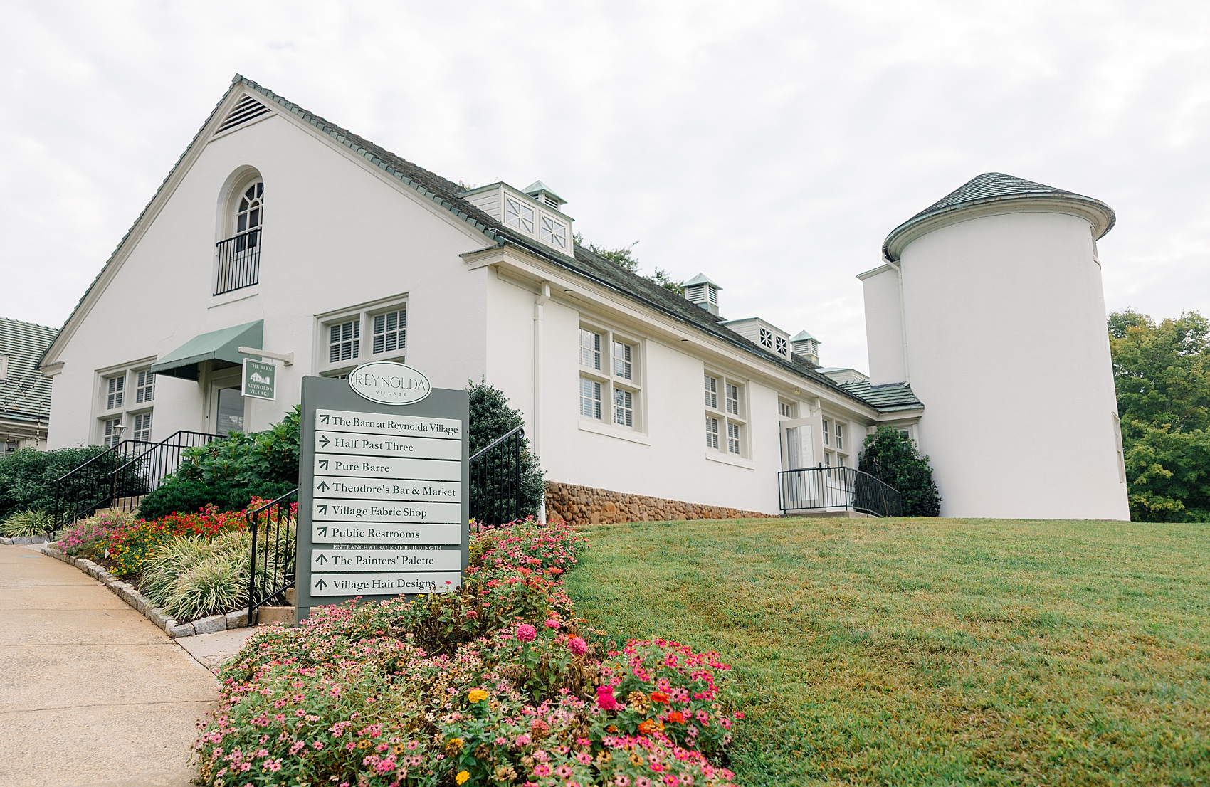 Details of the barn at reynolda village wedding venue with flowers blooming